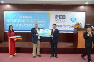 Mr. Adib Kouteili – Managing Director rewarded scholarships to HCM-IU’s representative