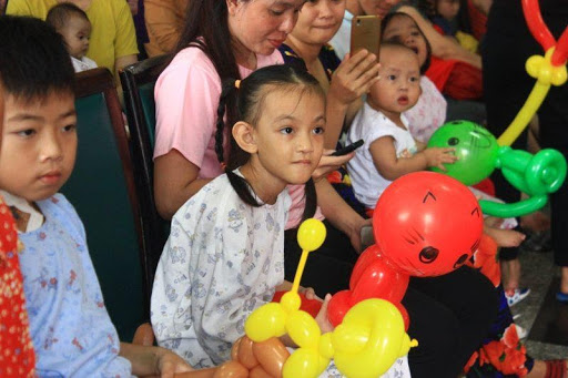 Photos of children participating in a loving Mid-Autumn Festival co-organized by PEB Steel